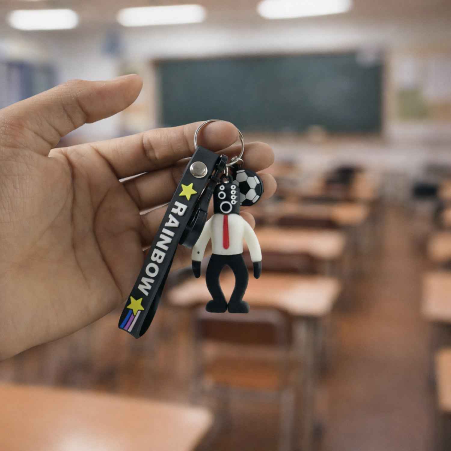 Rainbow Keychain – Colorful Cartoon Football Boy Accessory