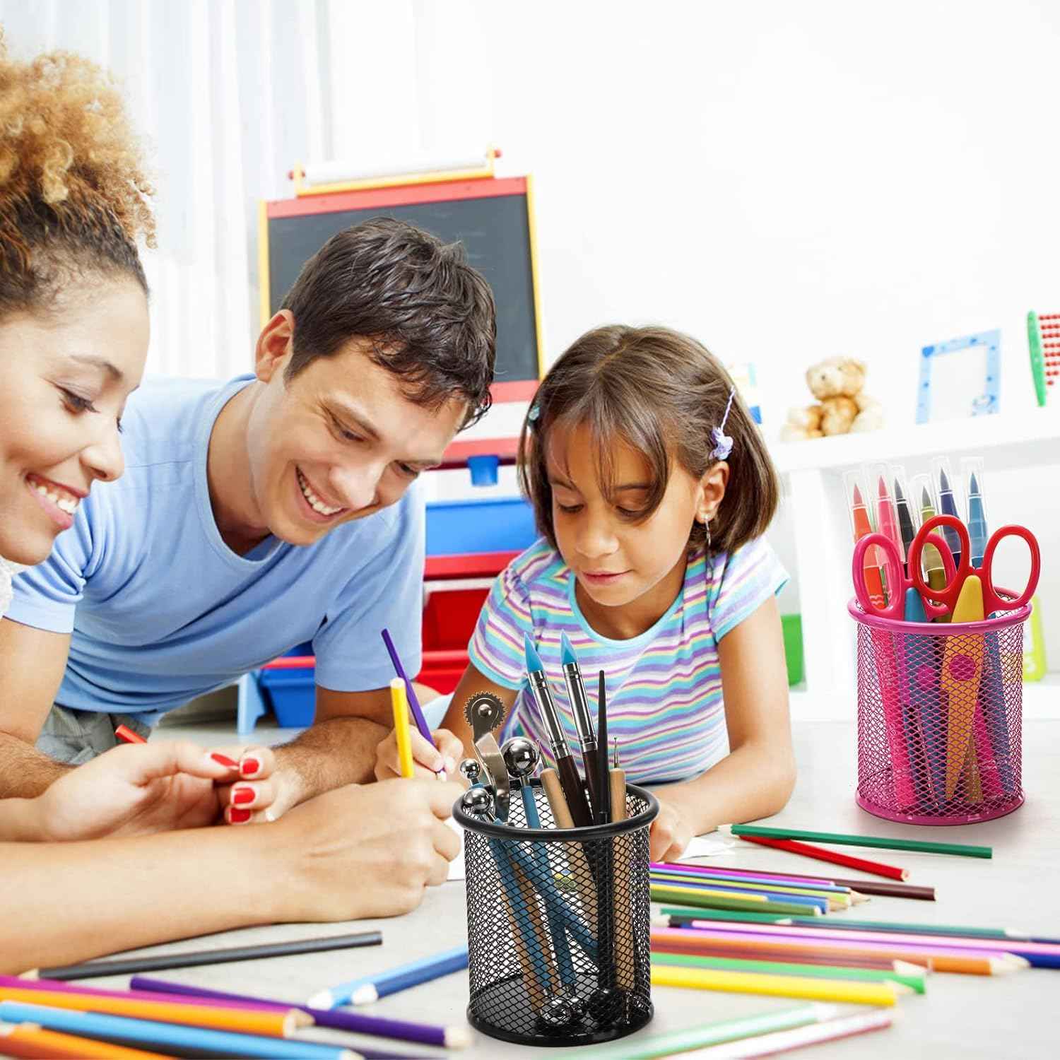 Compact metal mesh pen holder holding stationery, enhancing desk organization.