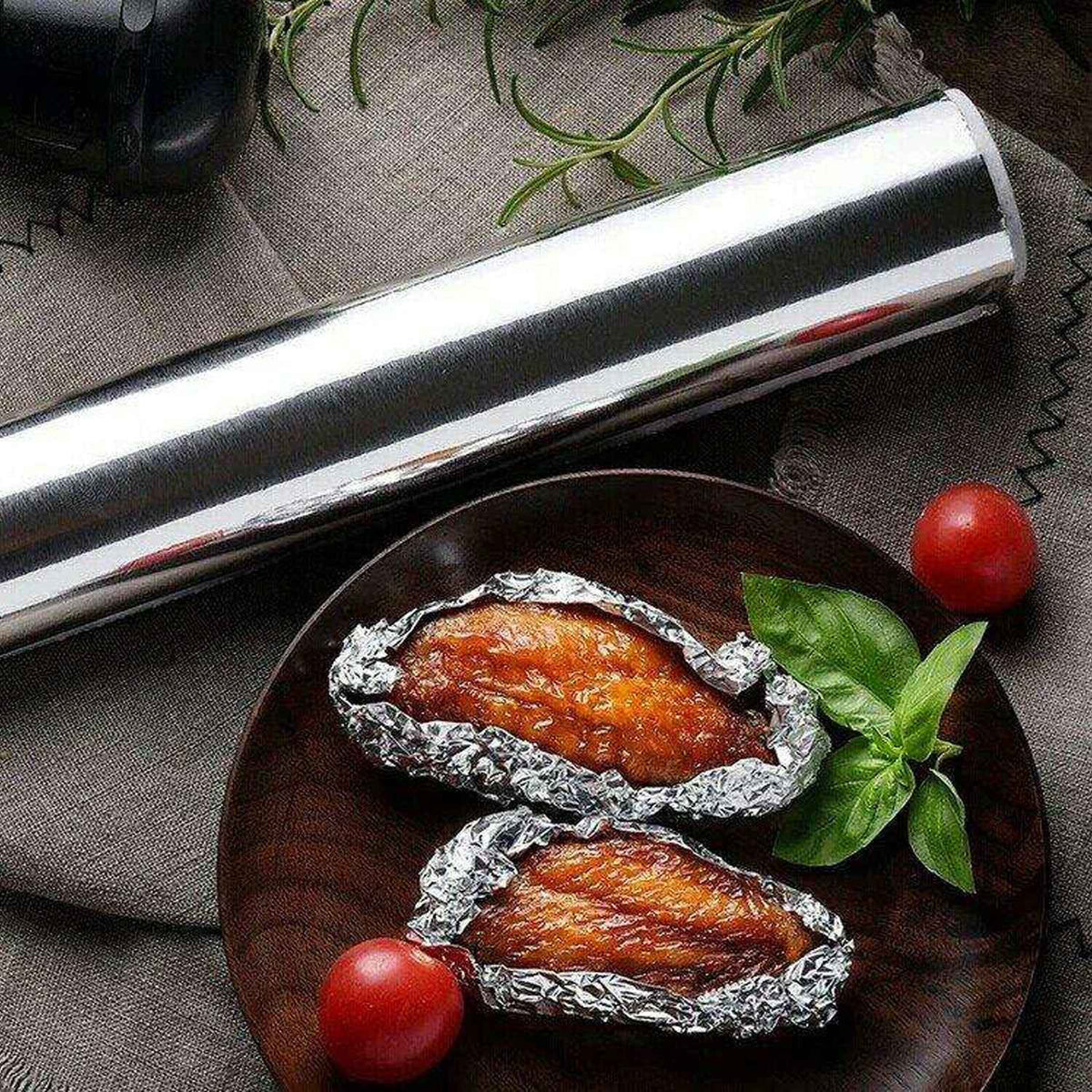 Heavy-duty non-stick aluminum foil roll for kitchen use.
