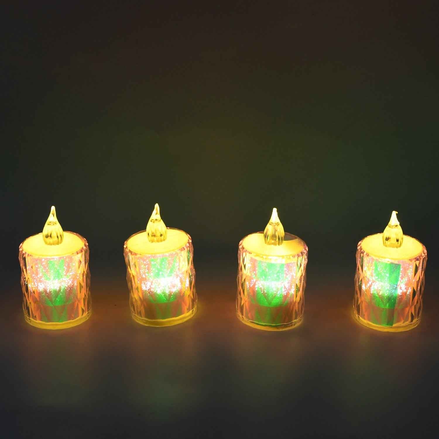 Multiple flameless LED candles beautifully arranged as part of a Diwali decoration setup.