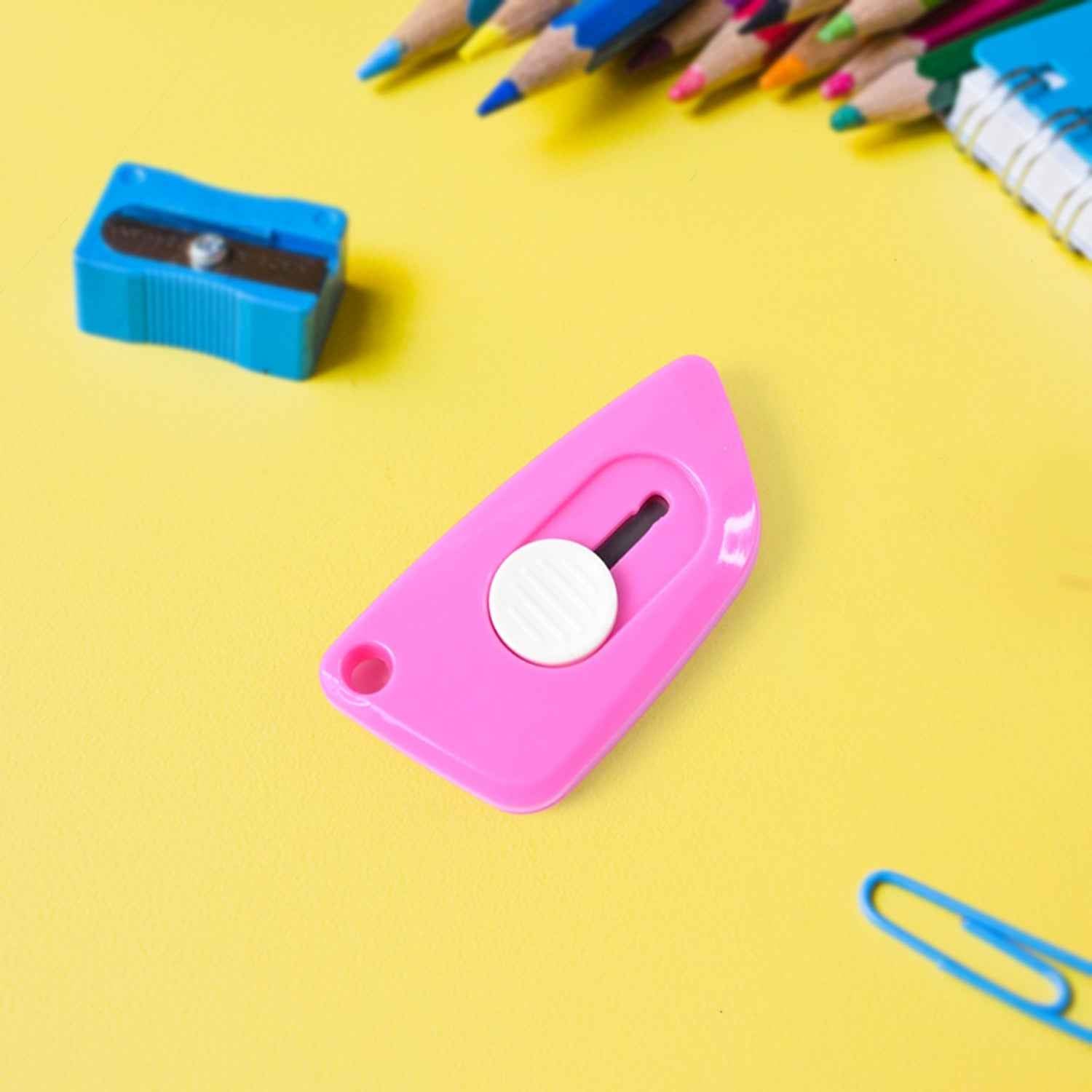 Mini Cloud Cutter utility knife showing keychain hole for easy portability