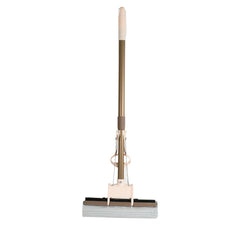 A user effortlessly cleaning a floor with the self-cleaning sponge mop, highlighting its maneuverability.