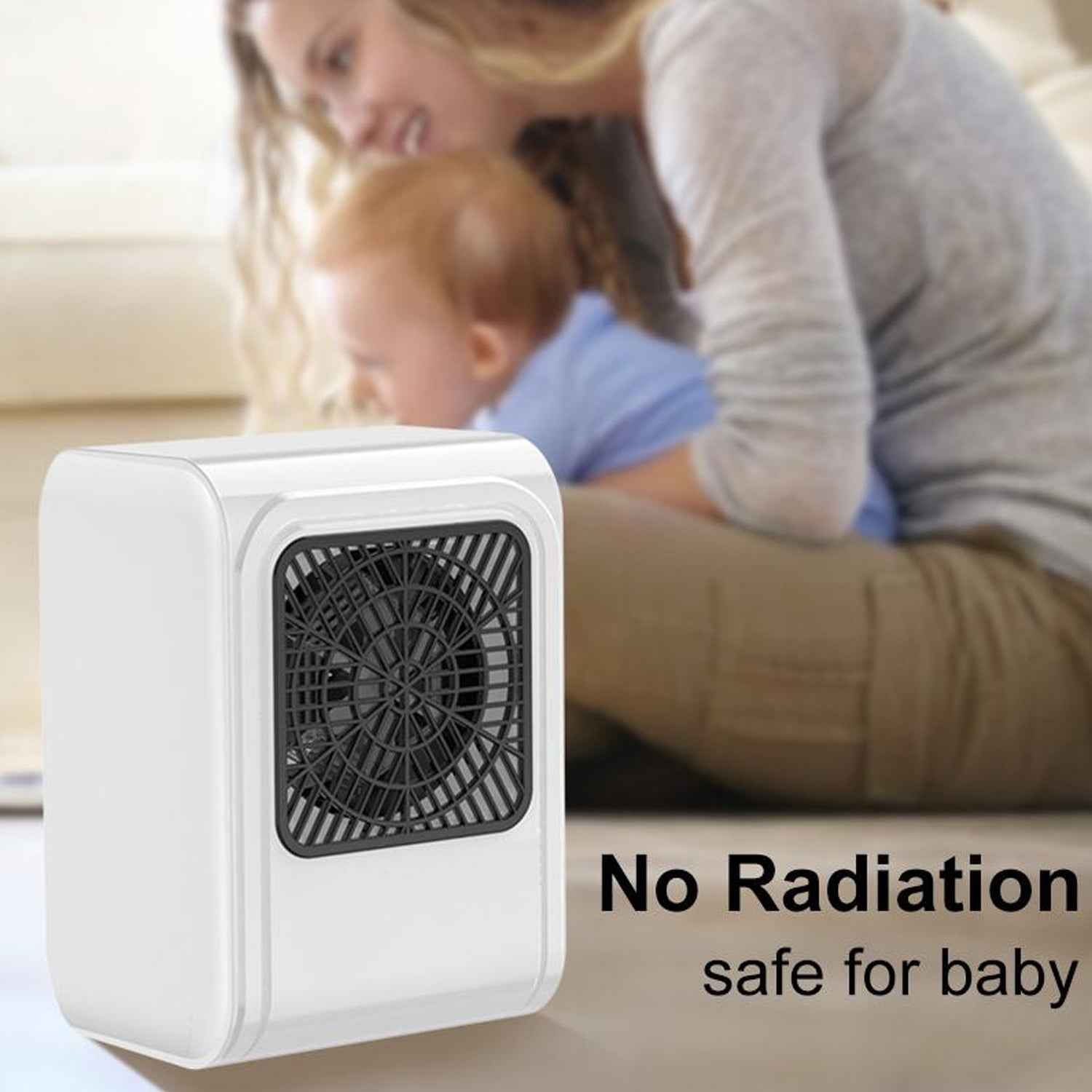 Small space heater providing warmth on an office desk.