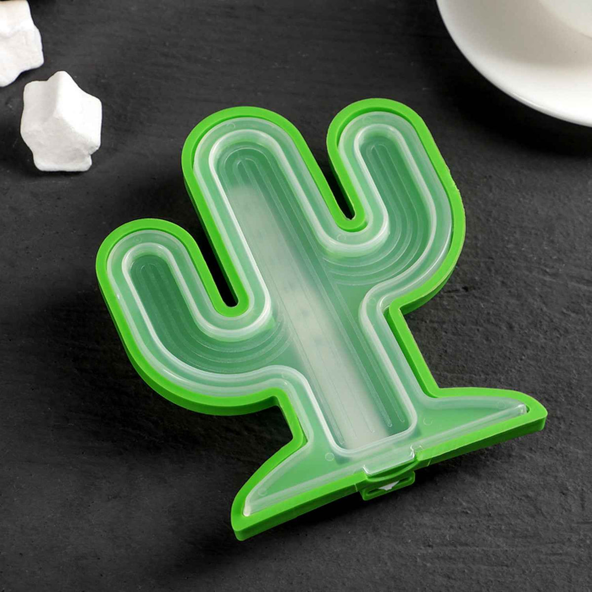 A vibrant green cactus silicone ice cream mold, ready for DIY frozen treats.