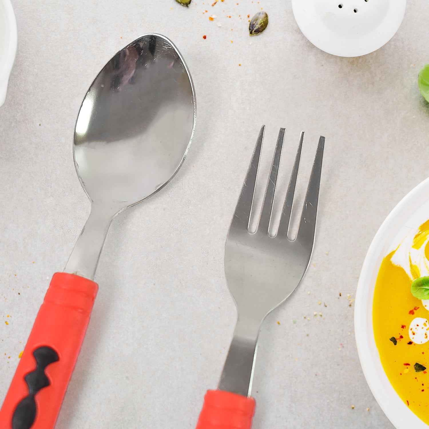 A full view of the Serve Stellar 24-piece flatware set with its stand.