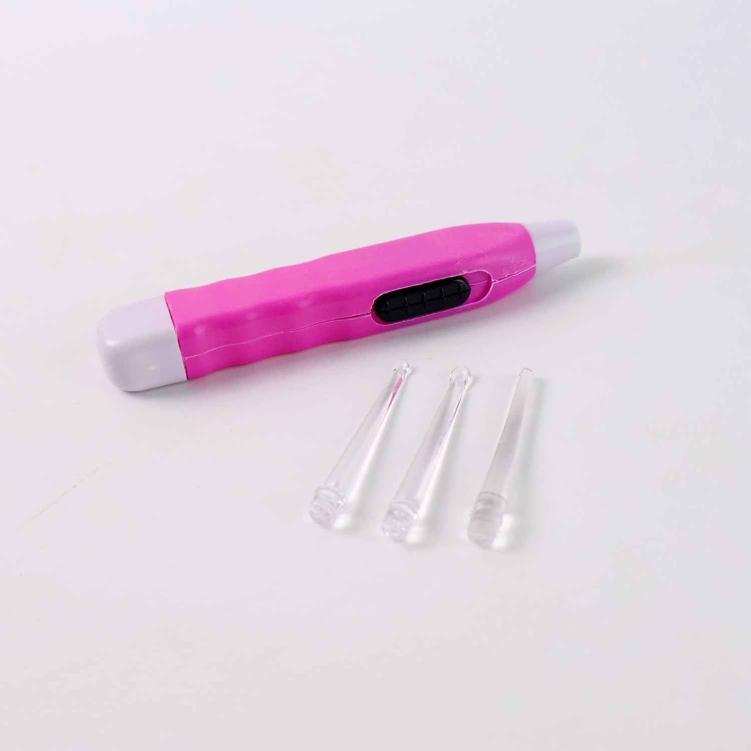 Detailed view of ear pick with LED flashlight suitable for ear care