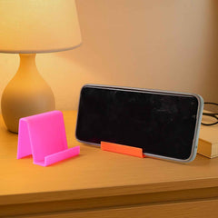 Mobile Phone Stand – Durable Plastic with Angled Support (2 Pc, Mixed Colors)