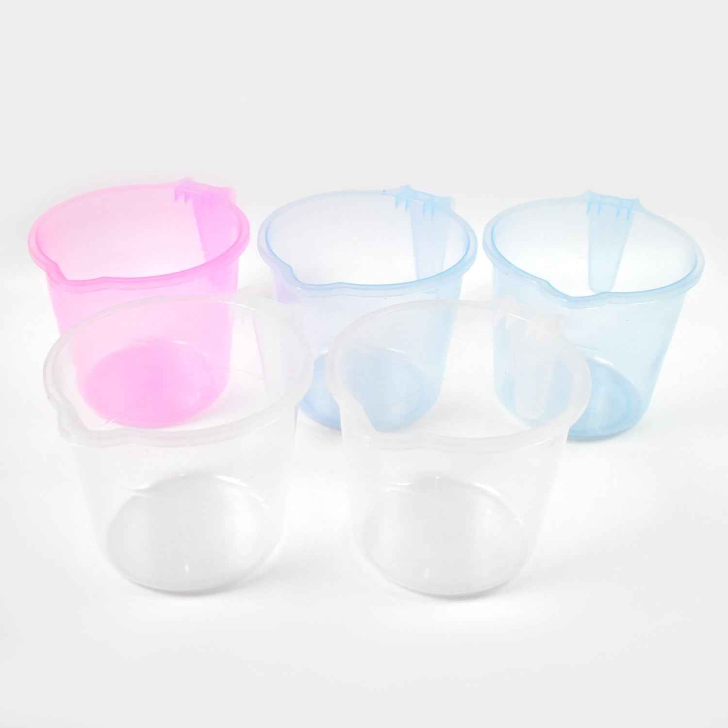 Ergonomic handle design on a transparent plastic bathing mug for easy grip.