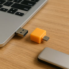 Close-up of the Micro USB OTG Adapter ports, illustrating connectivity options.