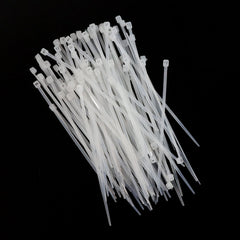Bundle of 3x100mm heavy-duty black nylon cable ties, ready for use.