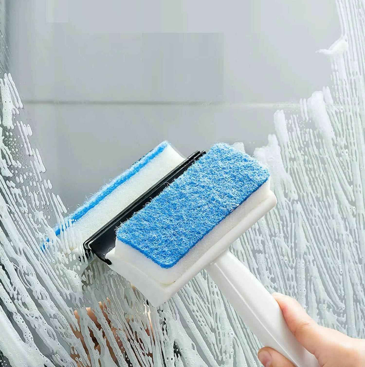 Ergonomic 2-in-1 Glass Wiper with brush for cleaning windows and mirrors.