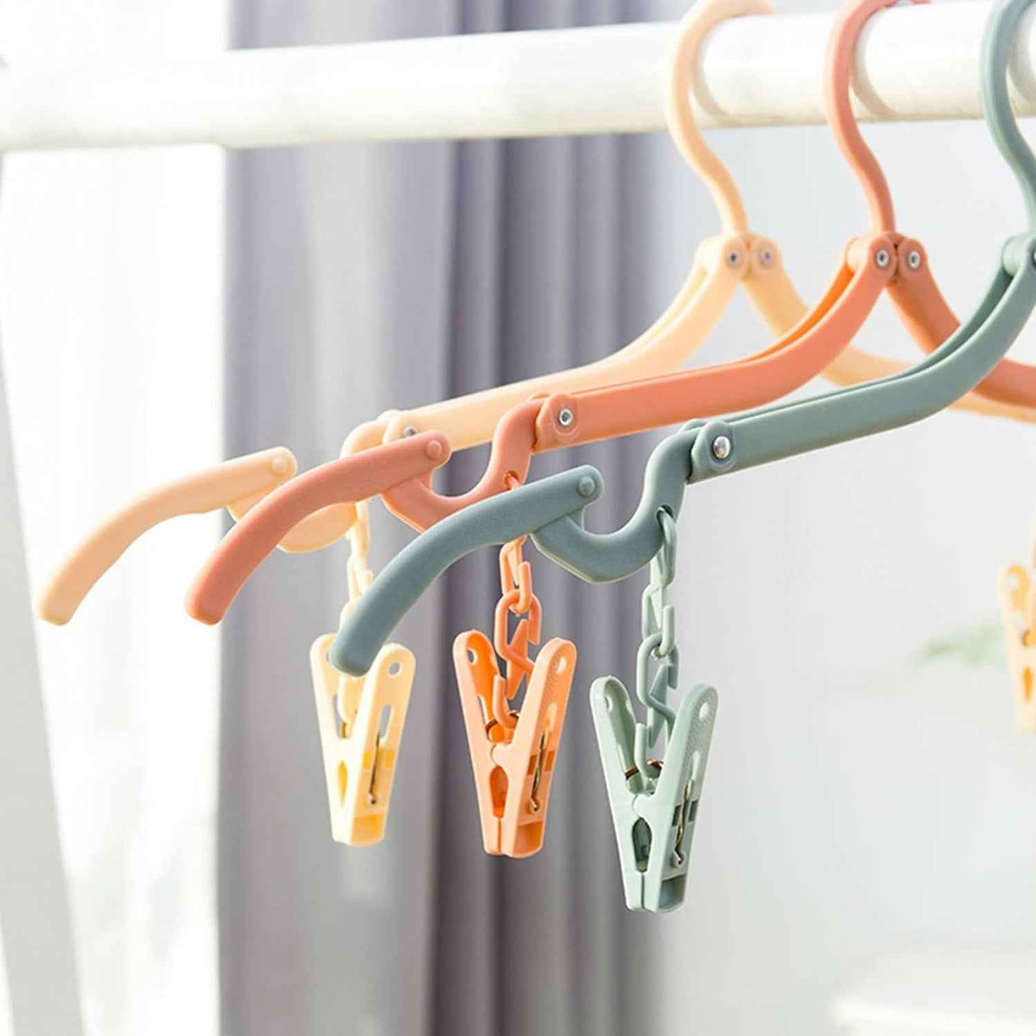 Adjustable Folding Clothes Hanger with Clips for Versatile Use
