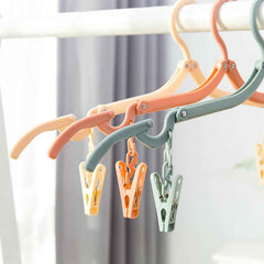 Adjustable Folding Clothes Hanger with Clips for Versatile Use