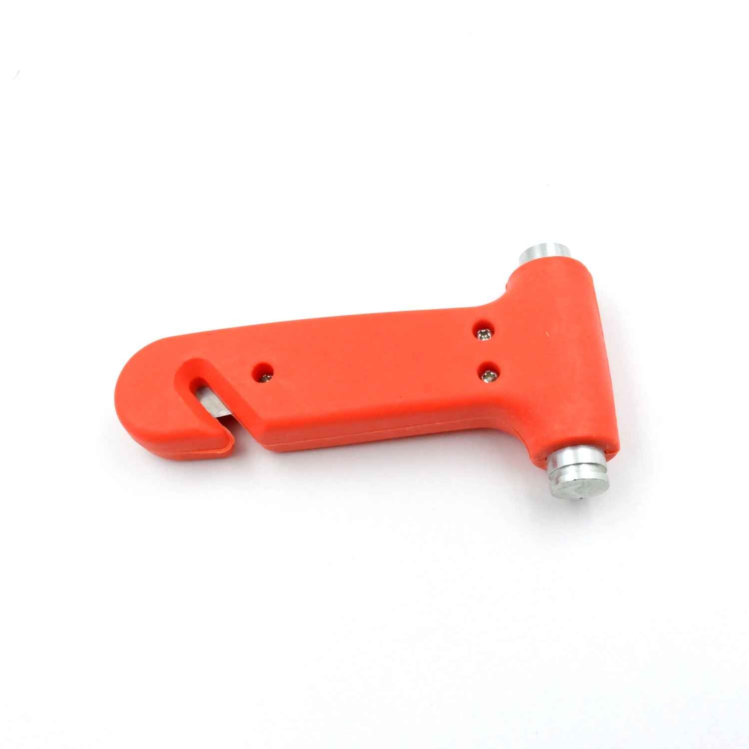 Compact car safety hammer displayed on a vehicle dashboard.
