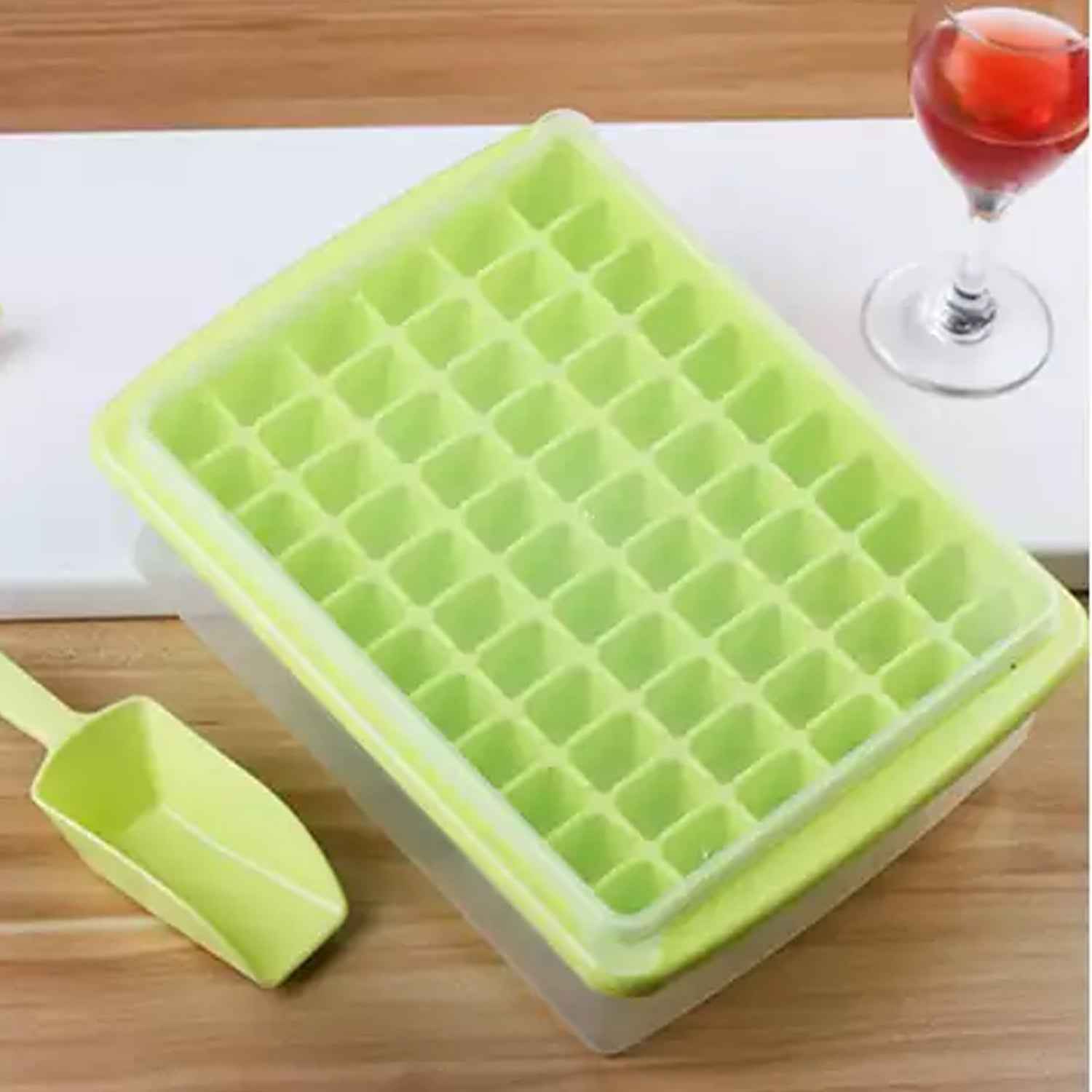 A hand gently twists the 60-Cavity Ice Tray, demonstrating its easy release feature.