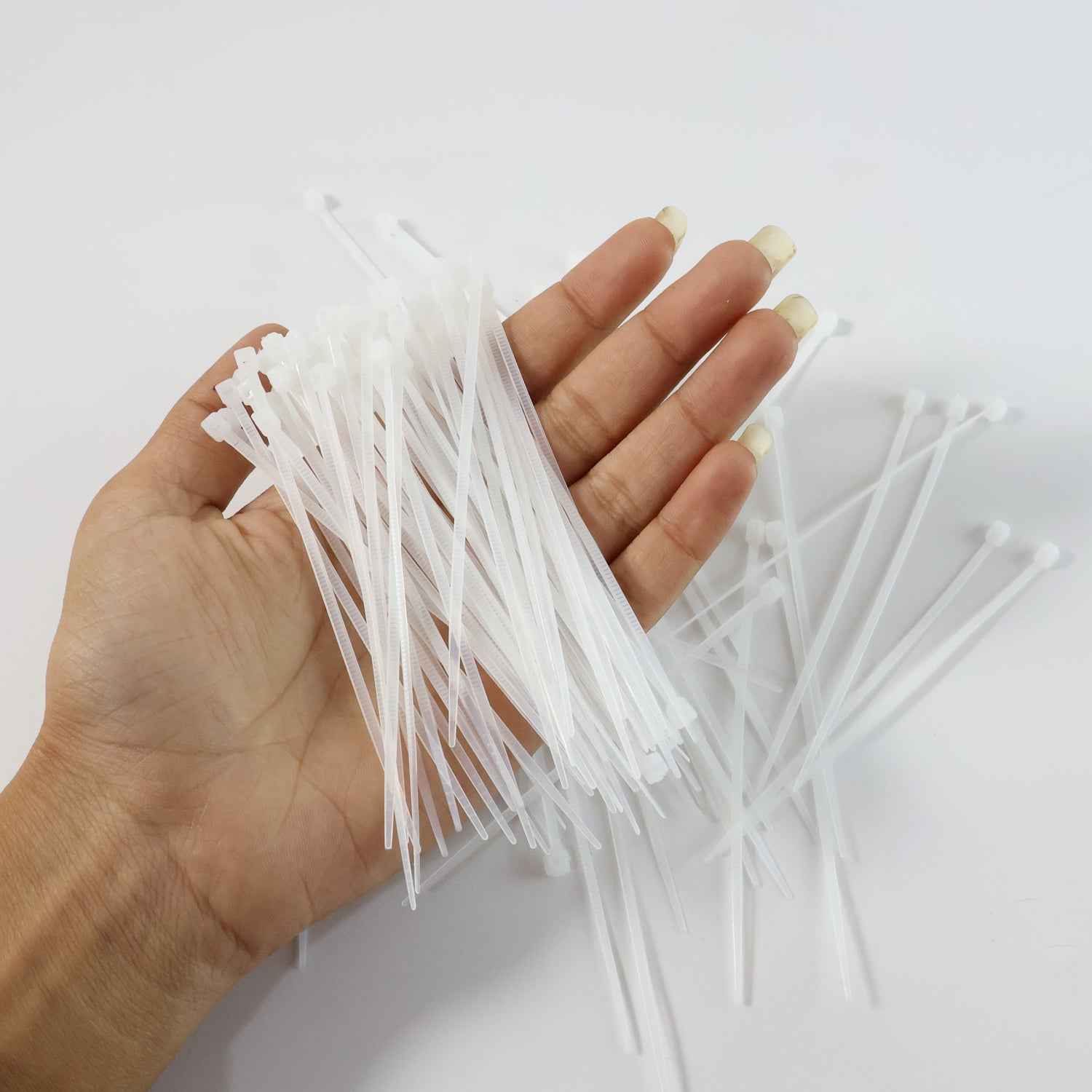 Nylon zip ties effectively bundling and organizing various electrical cords.