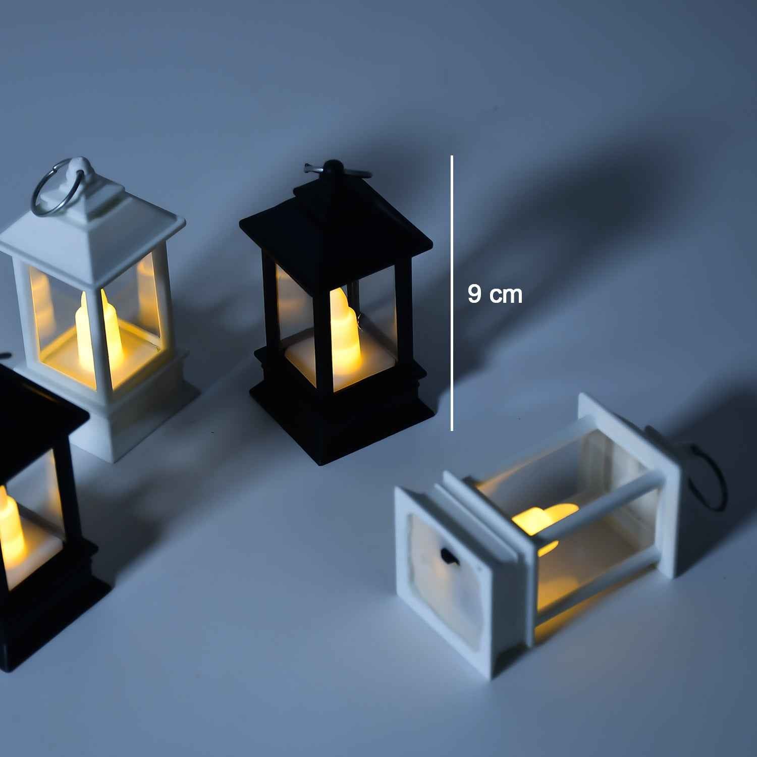 Group of flameless candle lanterns arranged for home decoration.
