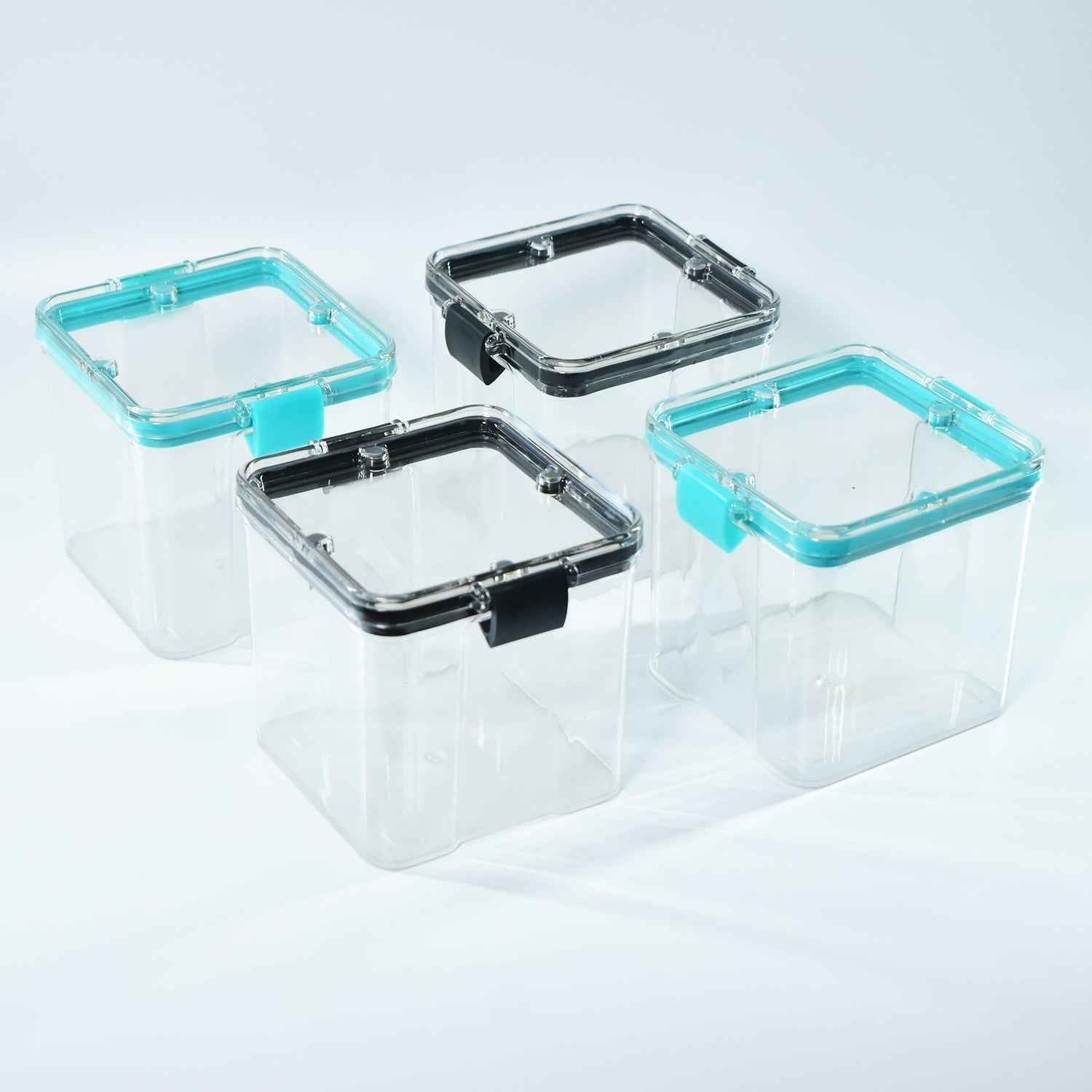 A set of four 700ml plastic food storage containers, perfect for storing dry goods.