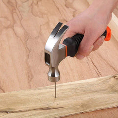 A hand holding the ergonomic plastic grip of the portable hammer, demonstrating comfort.