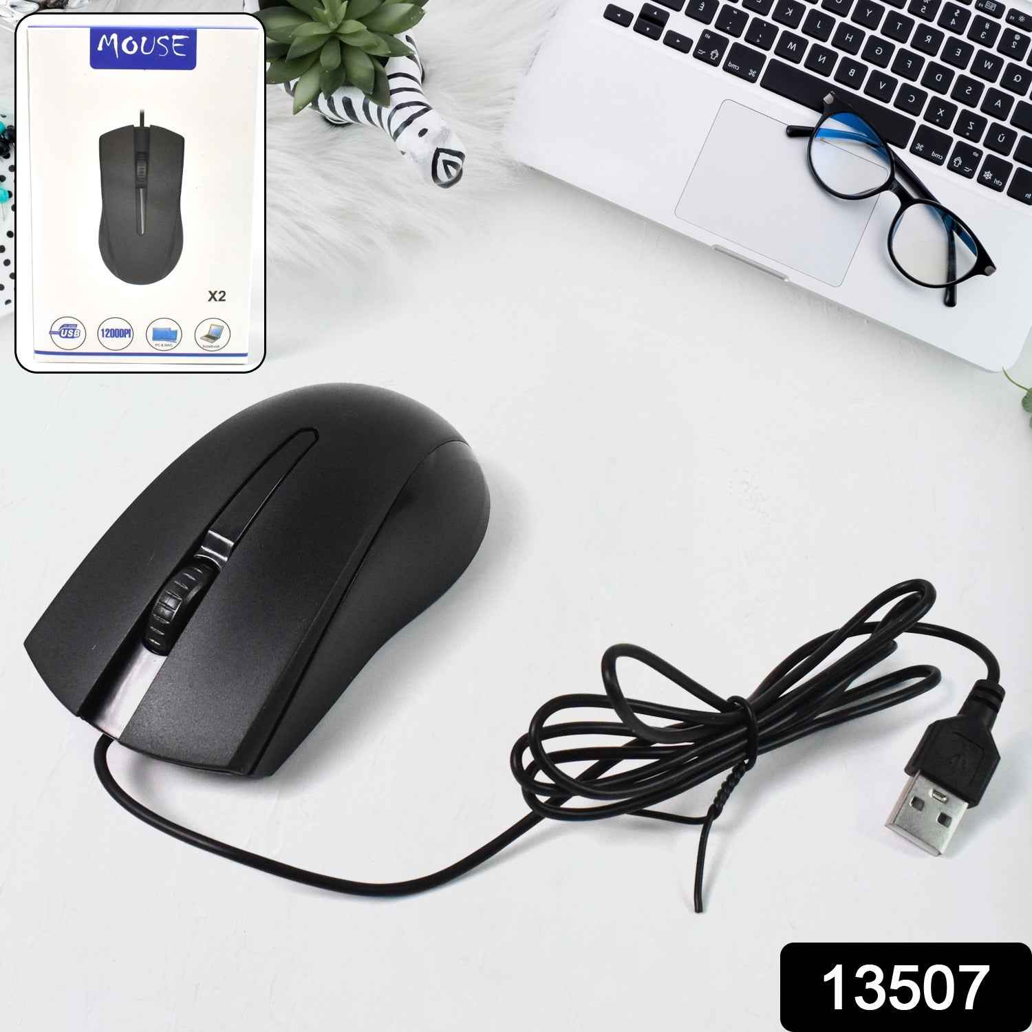 Close-up of the ergonomic Compshop X2 Wired Optical Mouse, highlighting its comfortable grip.