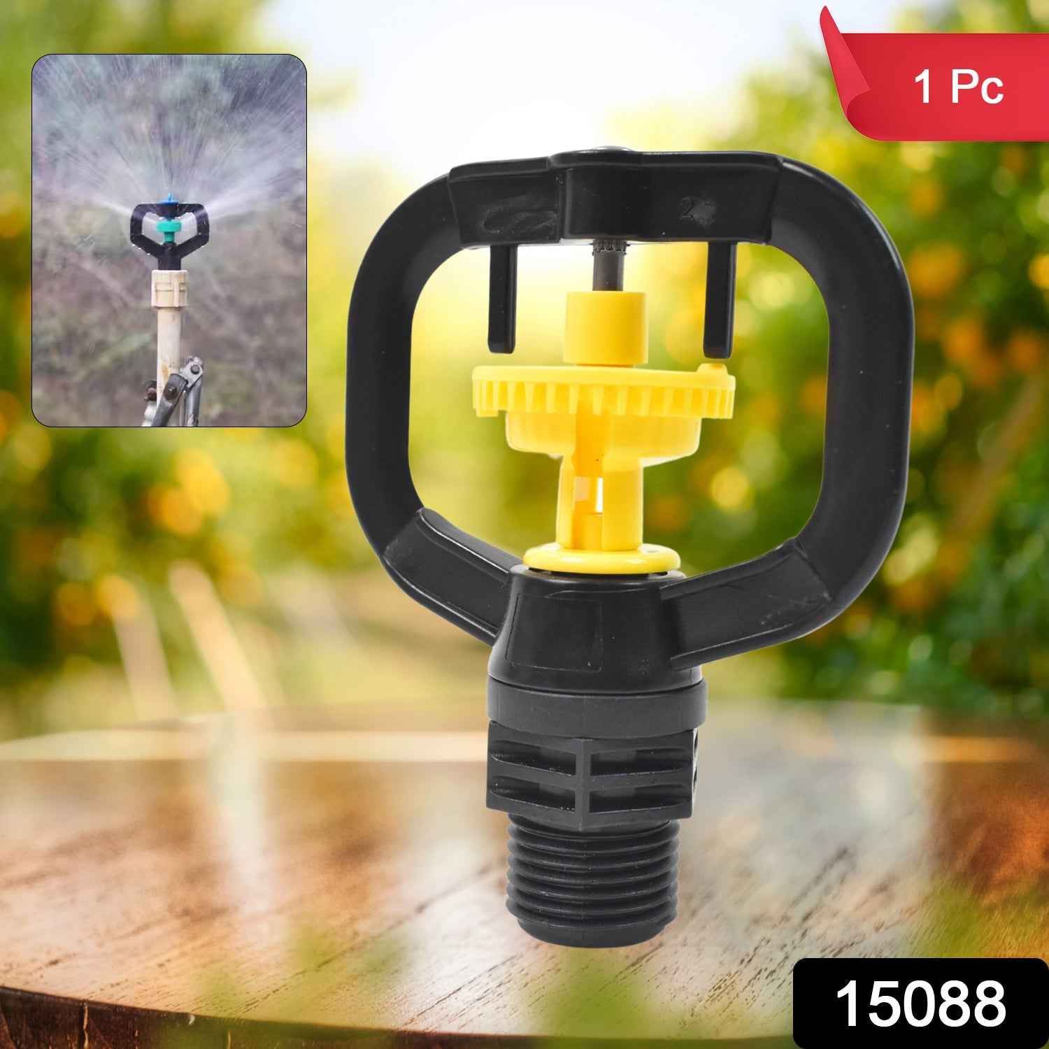 Rotating sprinkler nozzle effectively watering a lush green garden.