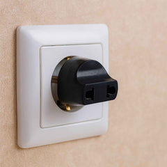 2 Pin Plug Adapter for universal to Indian sockets, shown in its color box packaging.