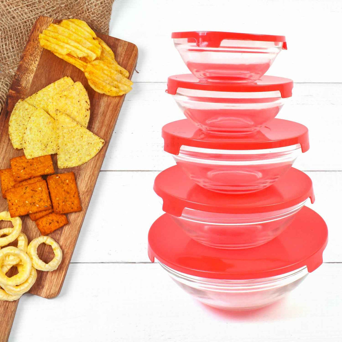 Organivo 5-piece glass bowl set with red lids, showcasing stackable design on a white background.
