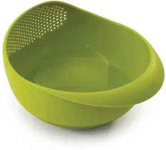 Ergonomic plastic rice strainer with handles, suitable for kitchen tasks.