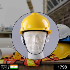 Close-up of a durable yellow plastic Construction Hard Hat.