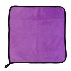 Multi-purpose purple microfiber cleaning cloth on surface