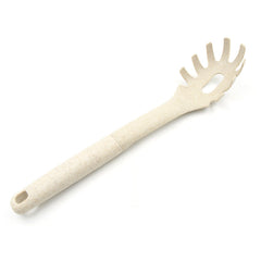 A plastic pasta server, highlighting its long handle for comfortable grip and heat resistance.