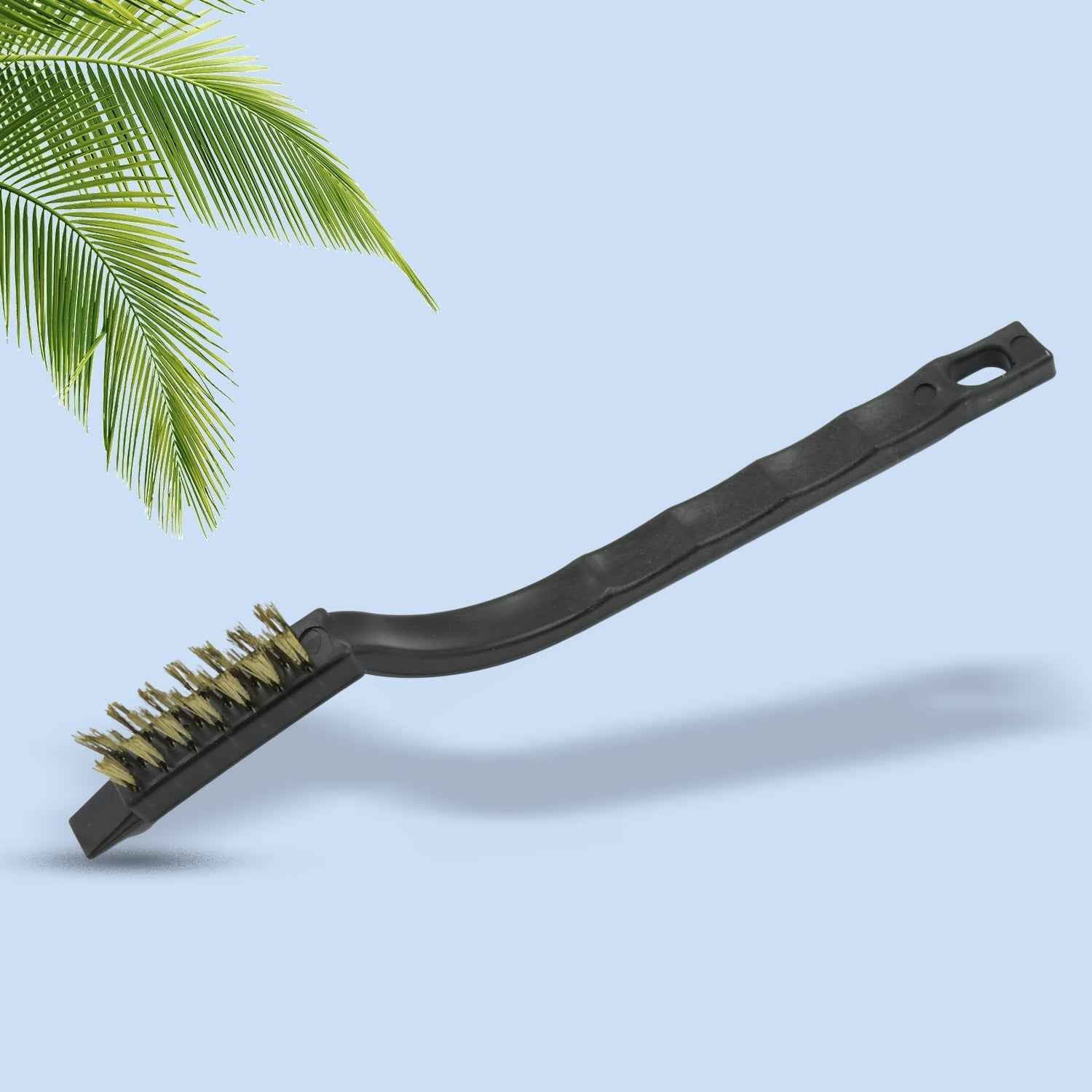Ergonomic handle of a mini wire brush, showing comfortable grip and hanging hole.