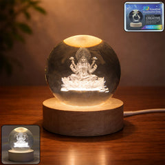 3D crystal Lakshmi ball LED night lamp with wooden base on table