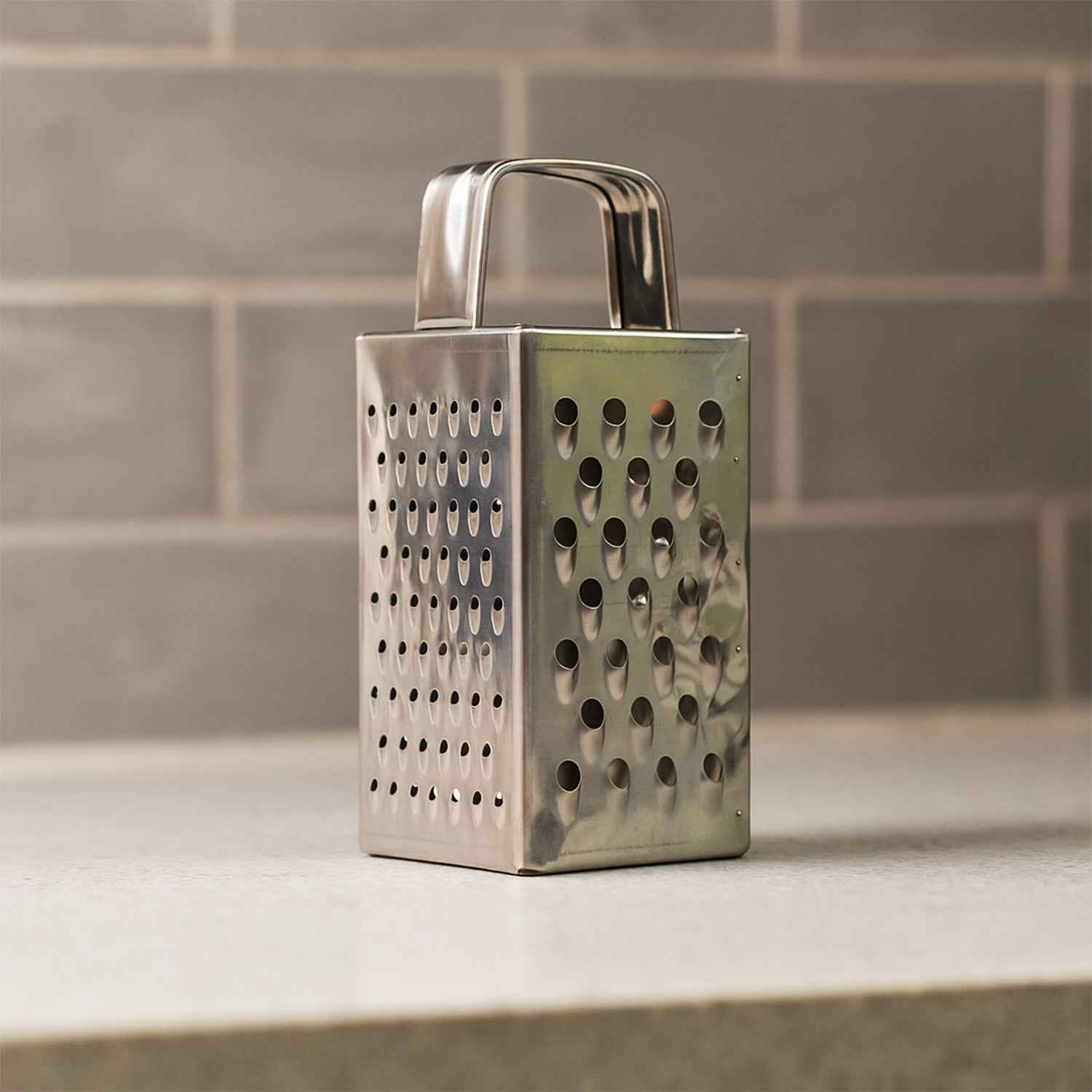 Stainless Steel 4-in-1 Compact Grater & Slicer – Durable Kitchen Tool