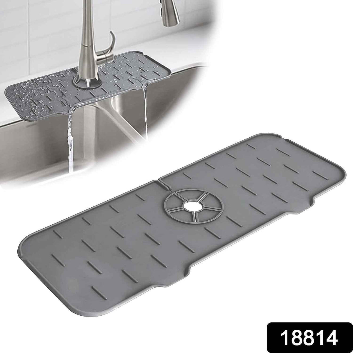 Close-up view of the flexible silicone faucet mat wrapping around a stainless steel kitchen faucet.