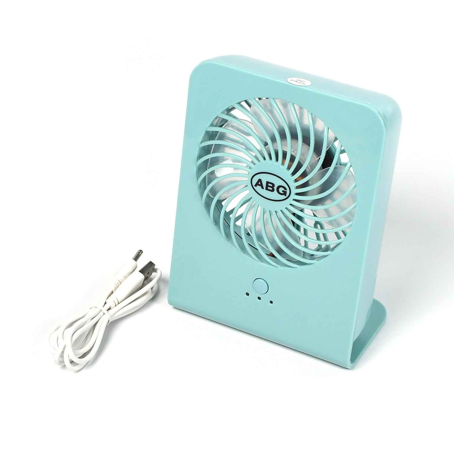 Close-up of the quiet four-blade design within the portable desk fan.