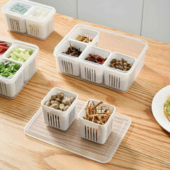Transparent fridge organizer drawer with various food items, making contents easily visible.