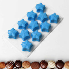 Variety of fruit and geometric shapes visible in a creative silicone ice cube tray.