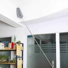 Microfiber duster with 100-inch extendable handle cleaning a high ceiling.