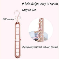Versatile folding hanger with nine holes, demonstrating its compact storage capability.