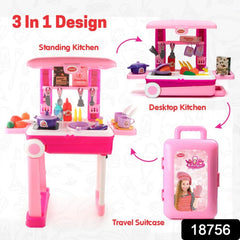 Girl playing with portable kitchen set, showing cooking toys
