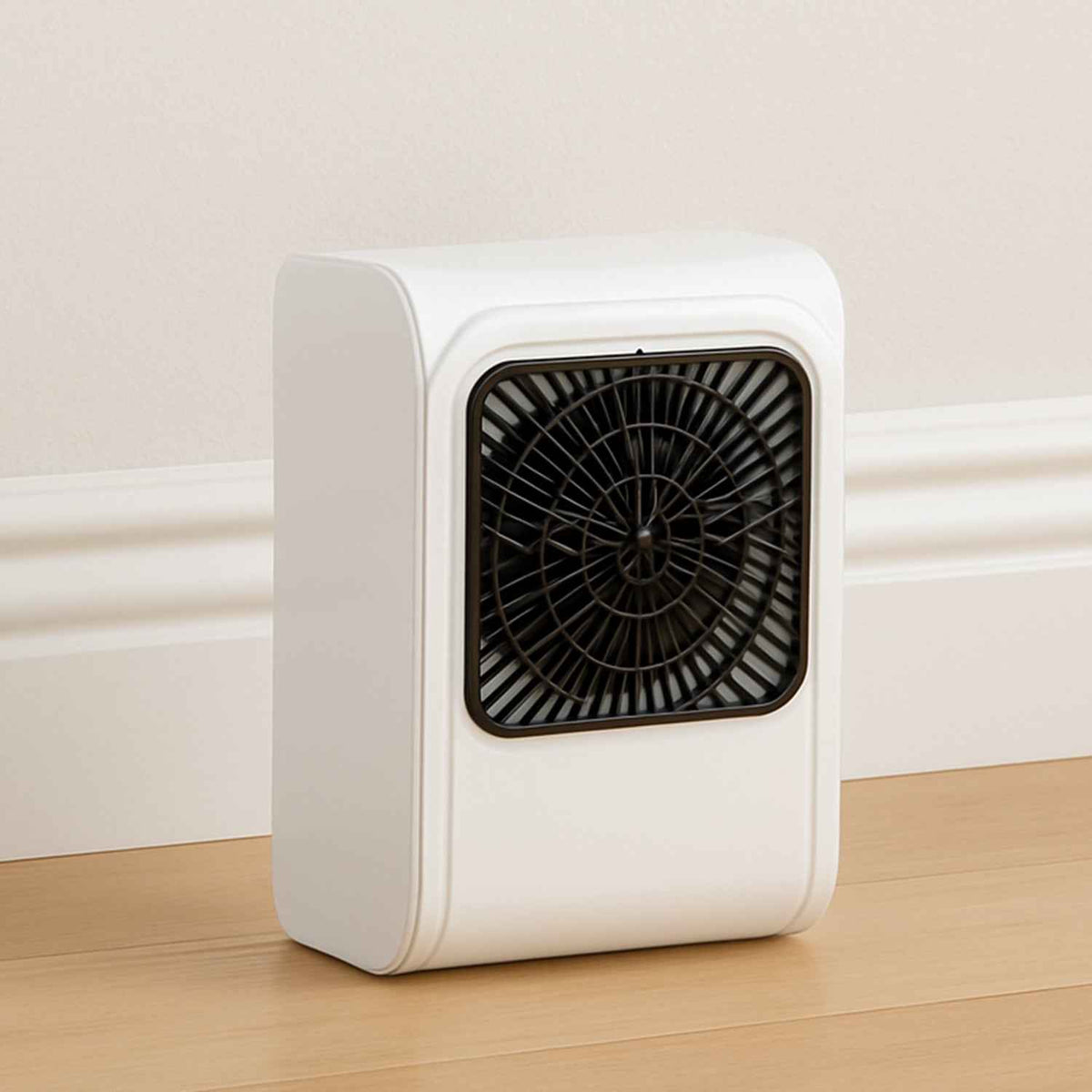 Compact brown box room heater on a clean surface.