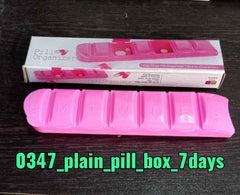 Top view of the heptagon-shaped 7-day medicine organiser, ready for use.