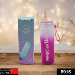Ergonomic glass water bottle featuring a protective rubber grip band for secure handling.