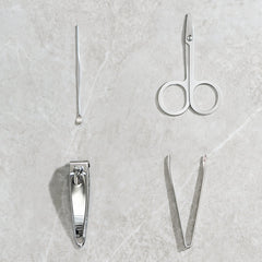 The AuriGlam 4-piece stainless steel nail clipper set displayed in its open case.