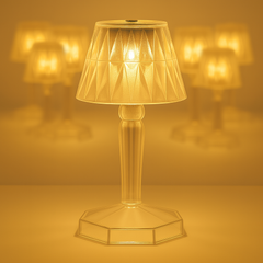 The crystal table lamp showcasing its unique reflection light effect in a dark room.