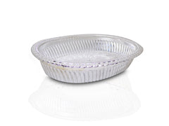 Close-up of a decorative oval silver tray with intricate royal patterns.