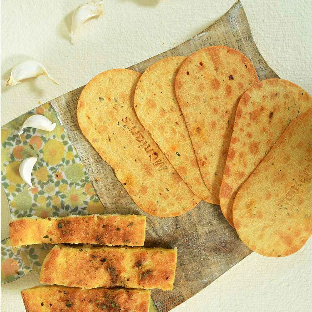 Close-up of Maniarr's Garlic Bread Khakhra, highlighting its crispy texture.