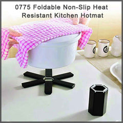Foldable silicone hotmat protecting a kitchen counter from a hot pot.