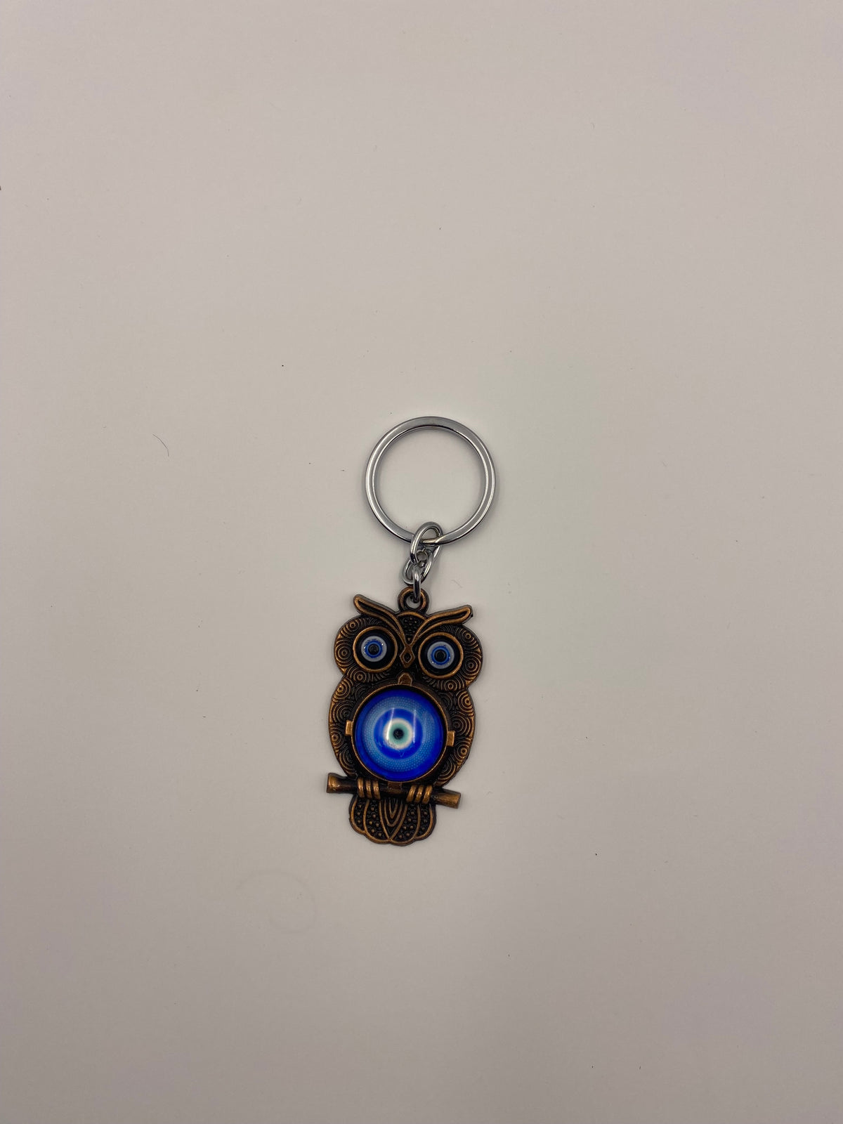 Trending evil eye owl metal keychain (1039)